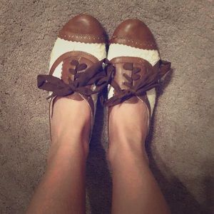 Lace and leather oxford style shoes